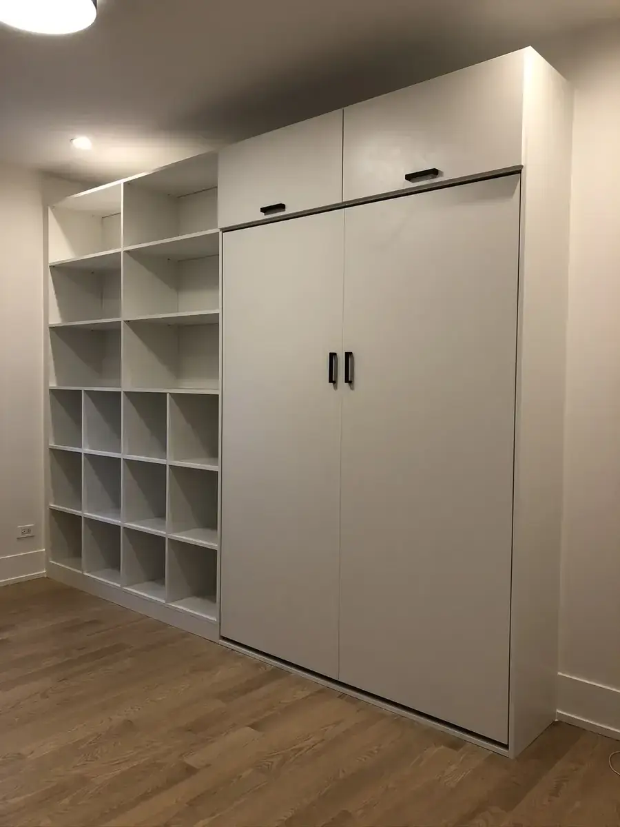 Murphy bed closed as wall cabinetry