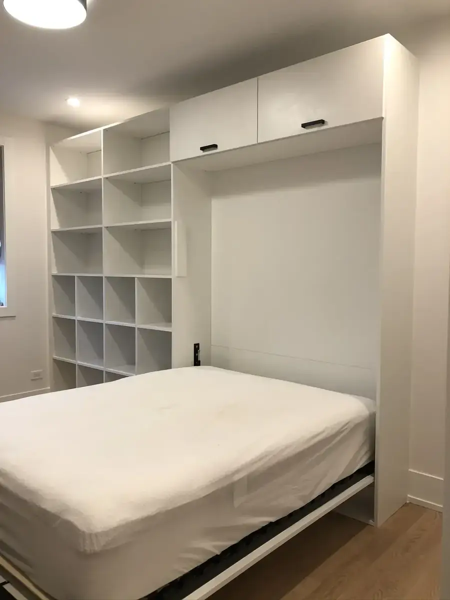 Murphy bed open with surrounding cabinetry